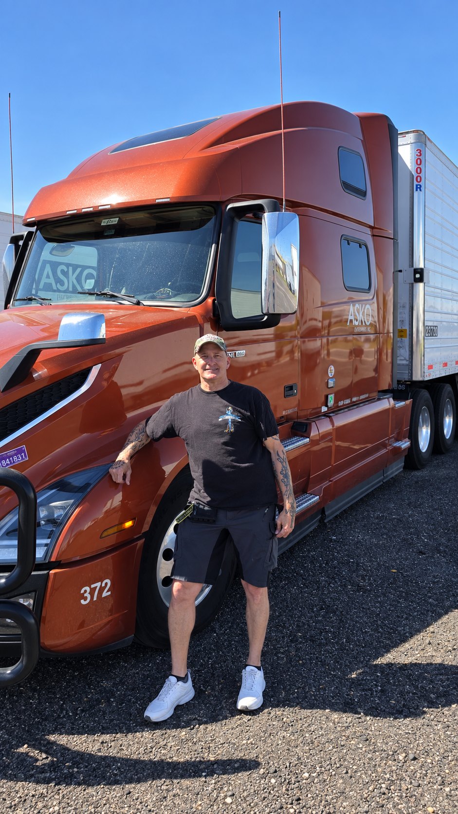 John Gillis beside a JASKO tractor