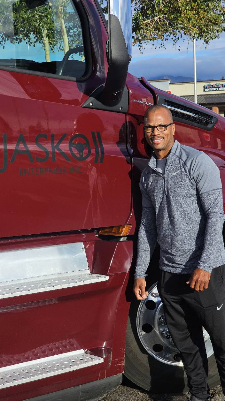 Kevin Roberts beside his JASKO tractor