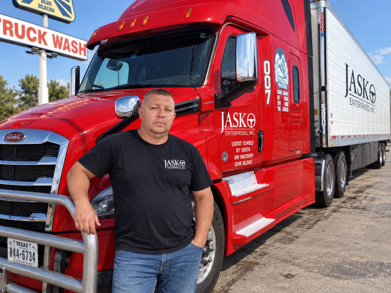 Suljo Memisevic beside his red JASKO tractor