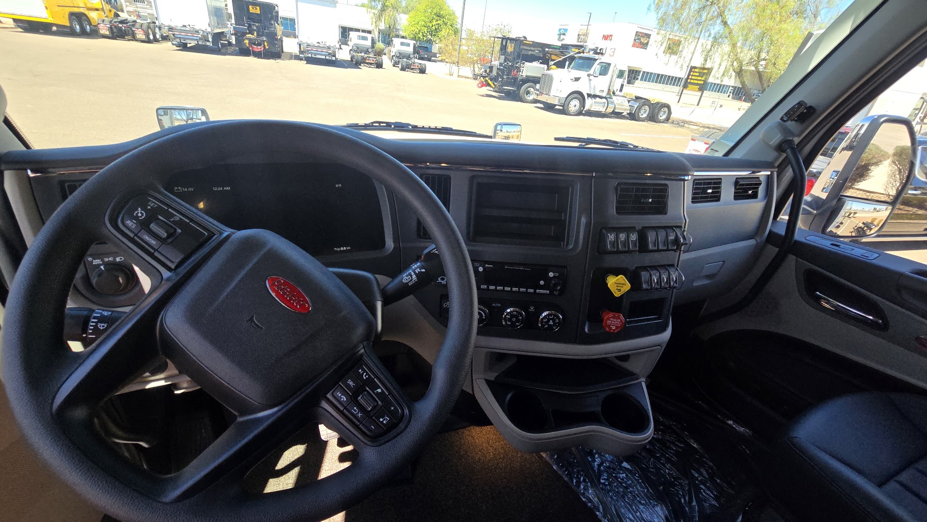 Peterbilt 579 cab interior with steering wheel and dashboard